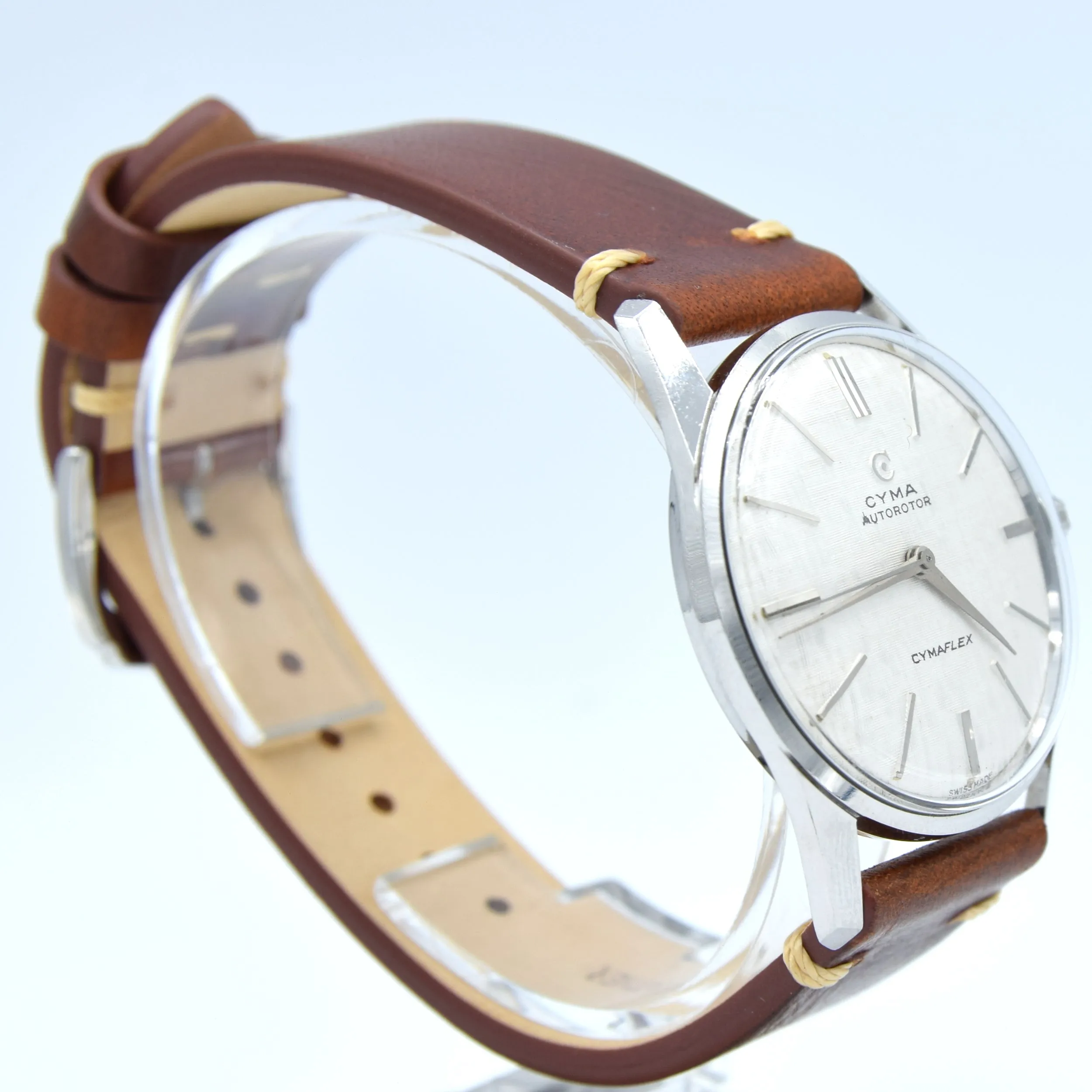 1960s larger Cyma autorotor Cymaflex Wristwatch with fabulous linen effect dial