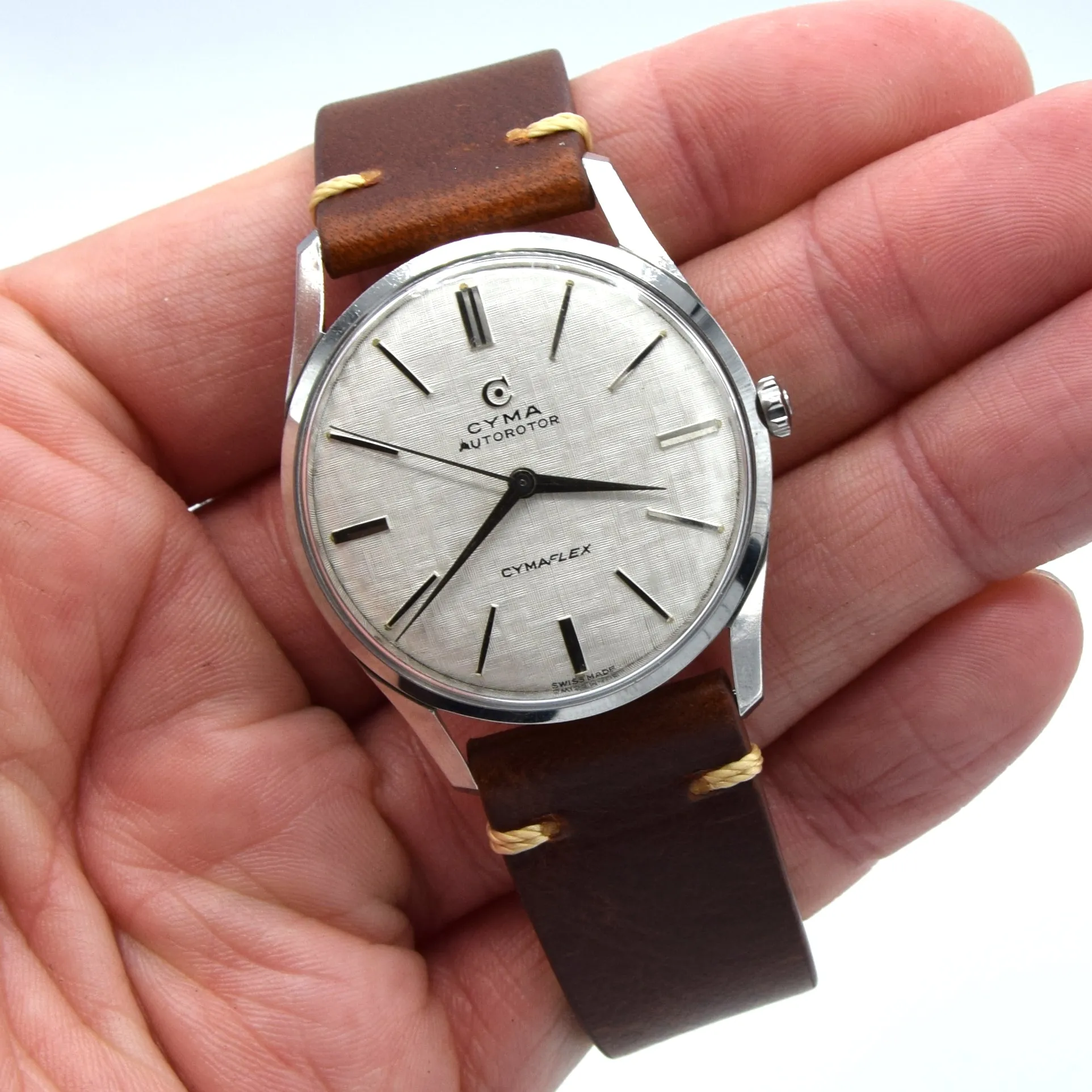 1960s larger Cyma autorotor Cymaflex Wristwatch with fabulous linen effect dial