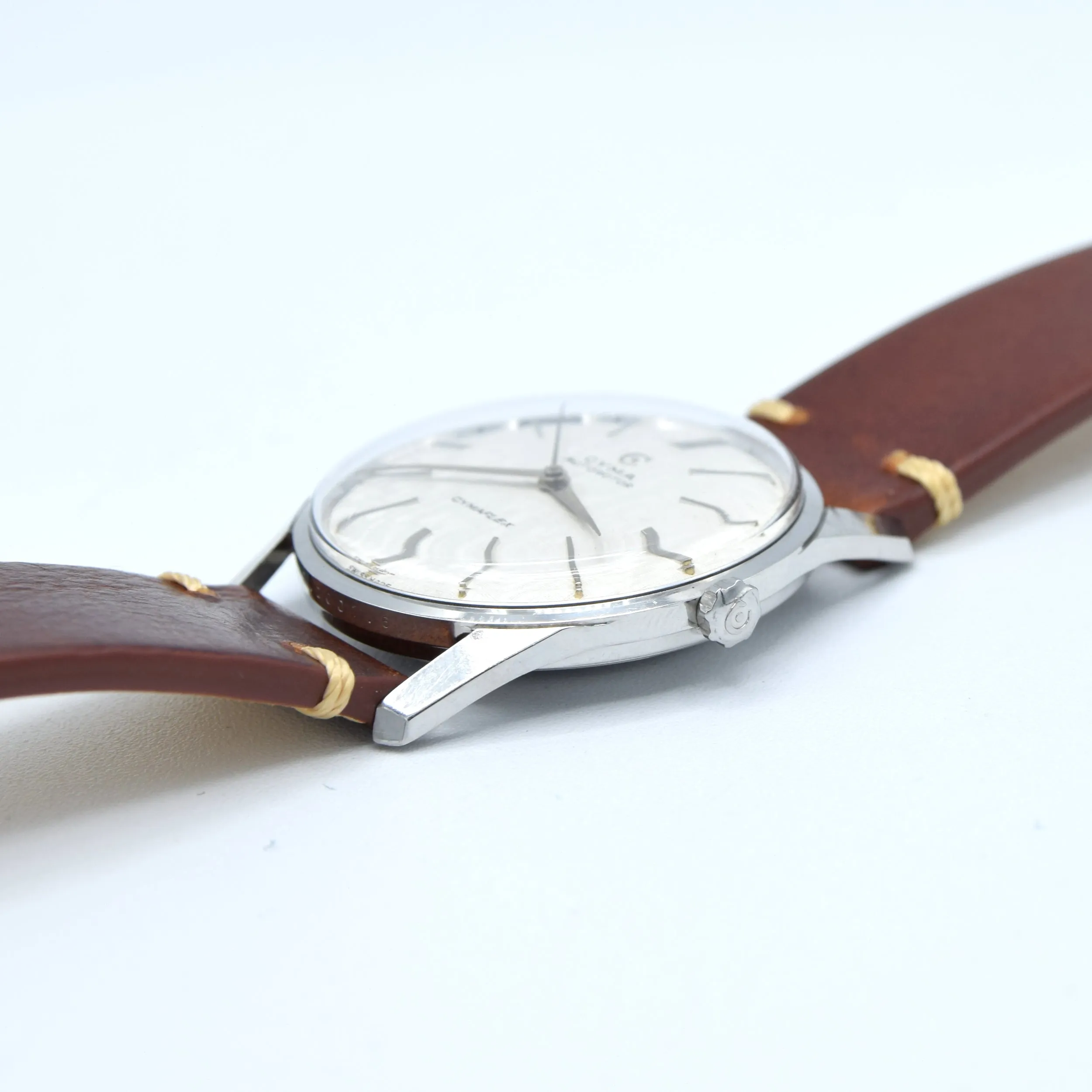 1960s larger Cyma autorotor Cymaflex Wristwatch with fabulous linen effect dial